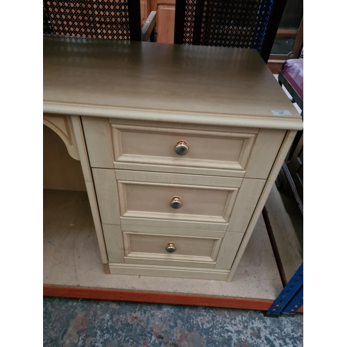 328 - A modern beech effect dressing table