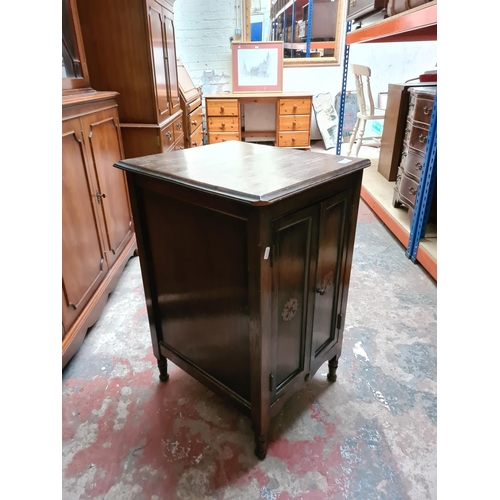 330 - A vintage oak two door cabinet