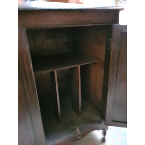 330 - A vintage oak two door cabinet