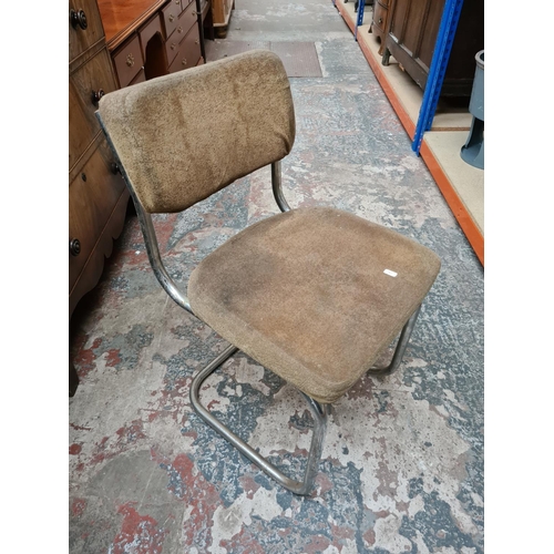 335 - Four mid 20th century tubular chrome and brown upholstered cantilever dining chairs in the manner of... 