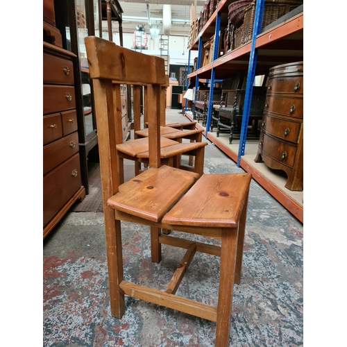 337 - A set of four Arts and Crafts style pine dining chairs