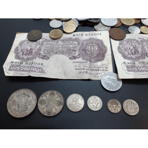 33A - A very varied collection of coins and banknotes of the world to include 50% silver 1942 half crown, ... 