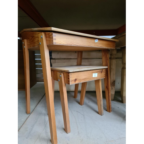 346 - Two vintage plywood child's school desks and a Mexican pine nest of three tables