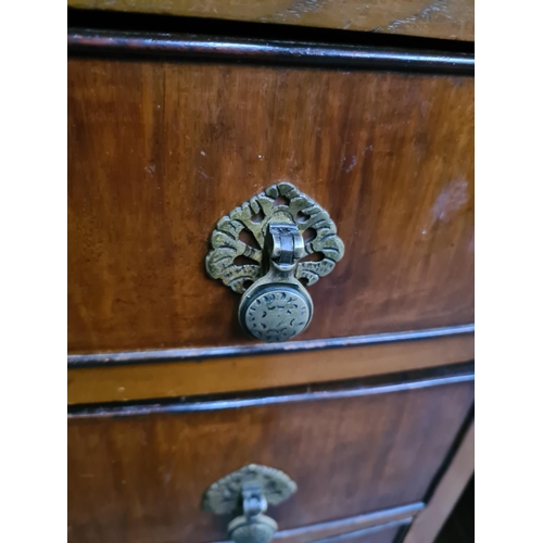 355 - A walnut bow fronted chest of four drawers - approx. 77cm wide x 83cm high x 51cm deep