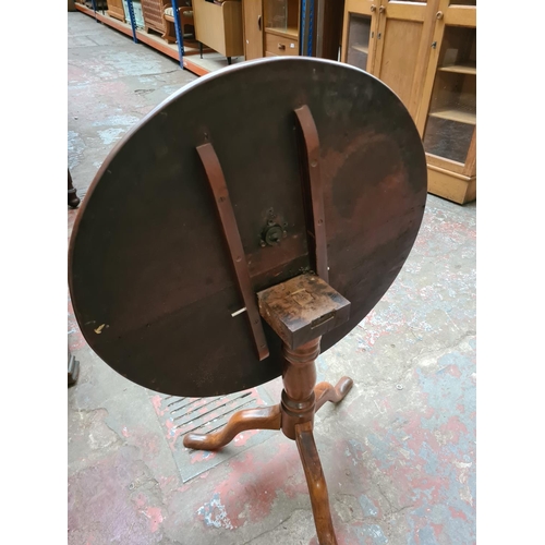 358 - A 19th century mahogany tripod tilt top occasional table