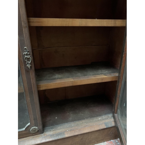 363 - A Victorian inlaid burr walnut display cabinet with gilt metal decoration - approx. 126cm wide x 111... 