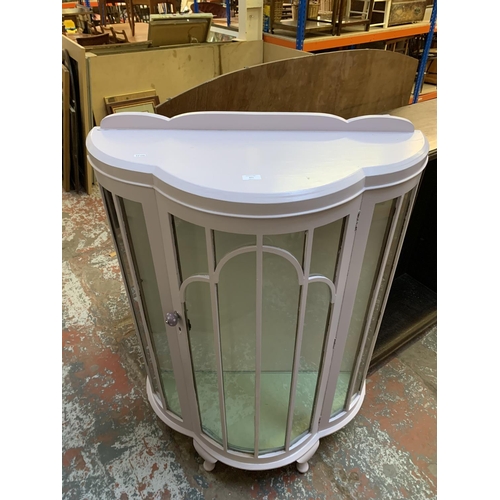 371 - A vintage lilac painted bow fronted display cabinet