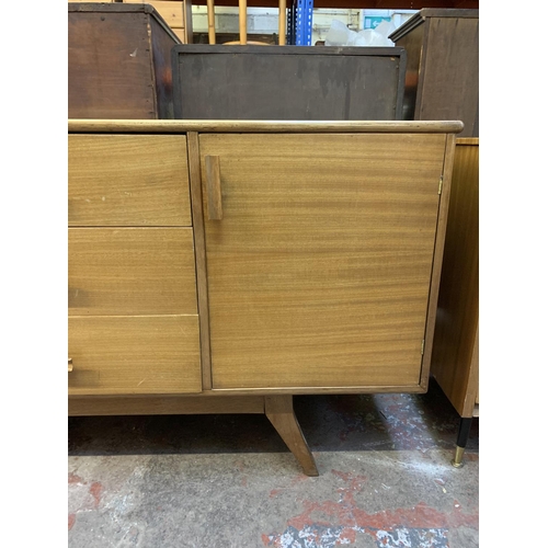 373 - A mid 20th century walnut sideboard - approx. 202cm wide