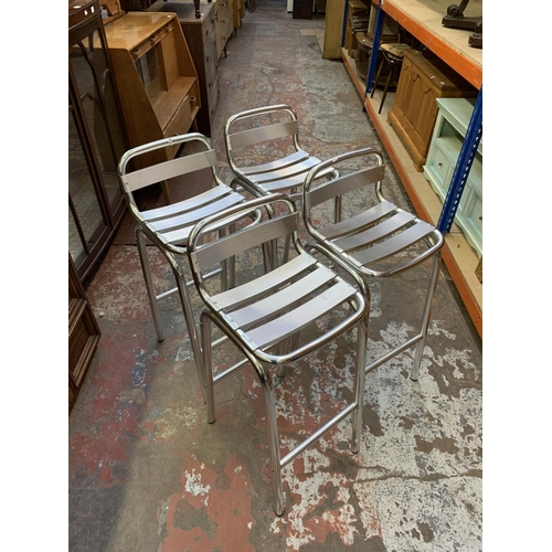 381 - A set of four chrome kitchen bar stools