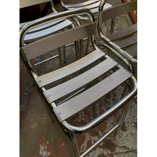 381 - A set of four chrome kitchen bar stools