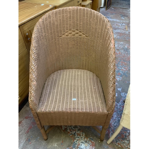 386 - Three various chairs, two Lloyd Loom style tub chairs and a Thonet style bentwood dining chair