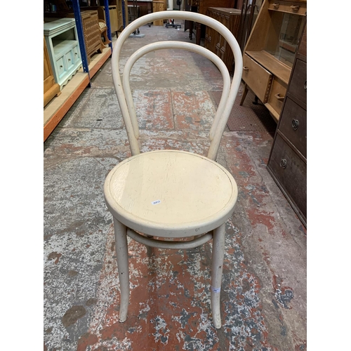 386 - Three various chairs, two Lloyd Loom style tub chairs and a Thonet style bentwood dining chair