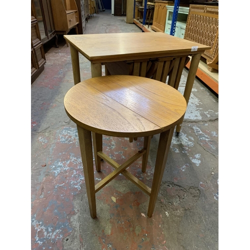 391 - A teak nest of four tables