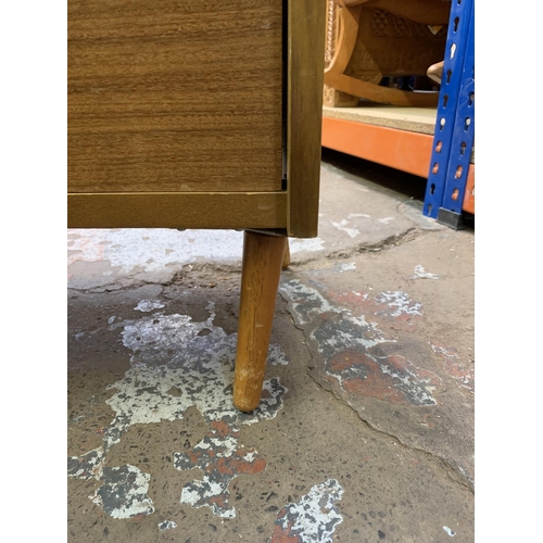 393 - A mid 20th century walnut display cabinet