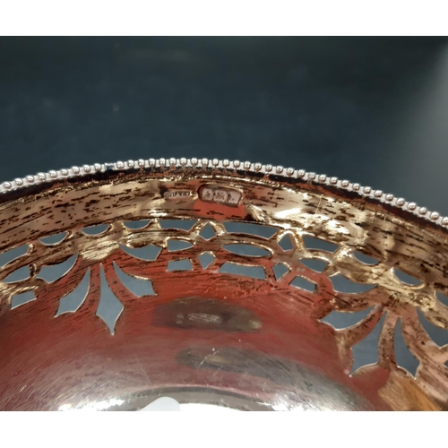 4 - Two hallmarked silver items to include a Birmingham pierced bowl - approx. 69.36 grams and 12.5cm di... 