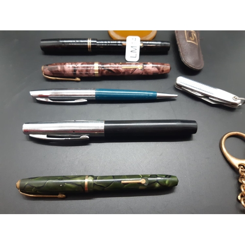 41 - Various items to include four various fountain pens with 14ct gold nibs - three Conway Stewart and o... 