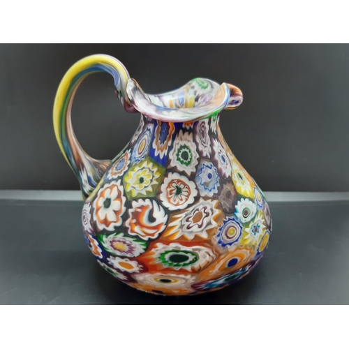 51 - A Murano style Millefiori glass jug - approx. 11.5cm high