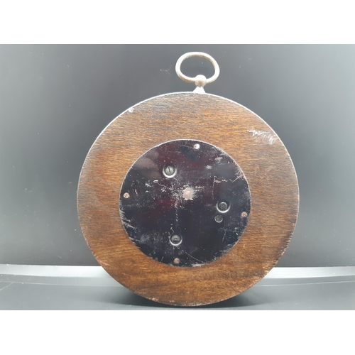 66 - A vintage carved oak circular aneroid barometer - approx. 16cm in diameter