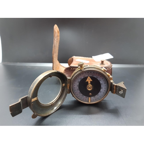 75 - A WW1 Verners Pattern prismatic compass with mother of pearl chart ring in brown leather case