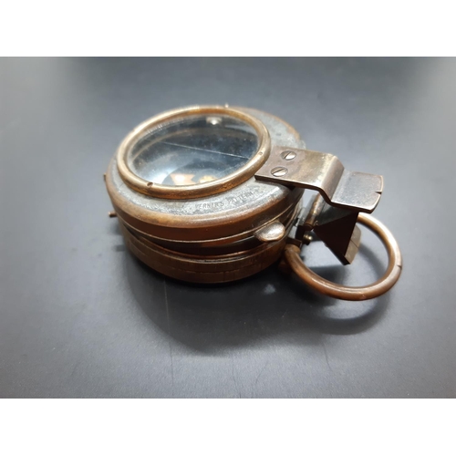 75 - A WW1 Verners Pattern prismatic compass with mother of pearl chart ring in brown leather case