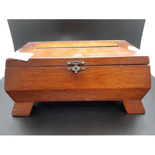 76 - A Georgian style mahogany sarcophagus jewellery box