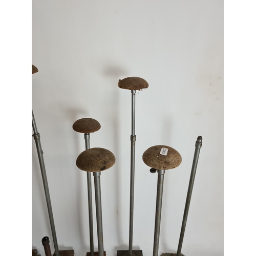 88 - Ten various Art Deco chrome plated and cast metal adjustable hat stands and a vintage carved wooden ... 