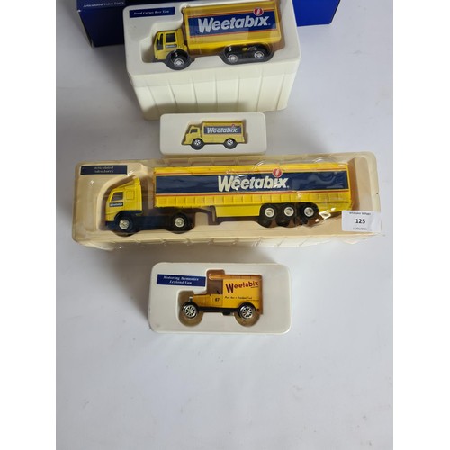 125 - Four Corgi Weetabix diecast vehicles to include articulated Volvo lorry, Leyland van, Leyland truck ... 