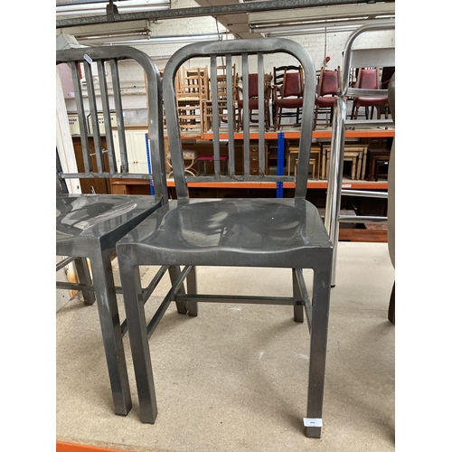 404 - A pair of aviation style stripped metal dining chairs