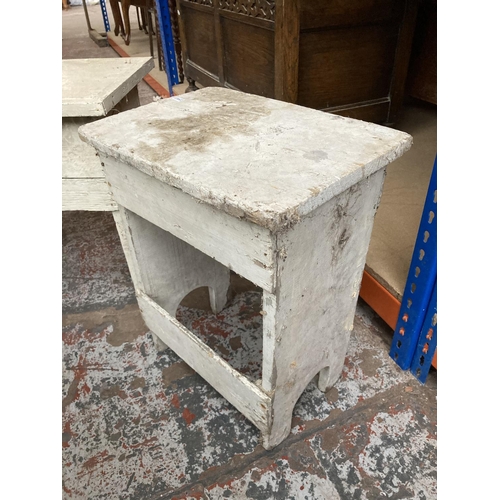 410 - Two primitive white painted elm kitchen stools