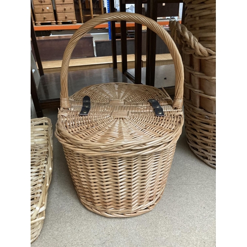 411 - Four various wicker baskets