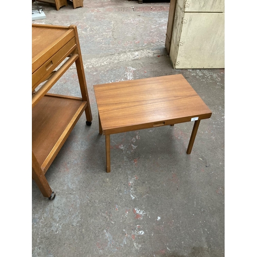 413 - A mid 20th century teak two tier tea trolley