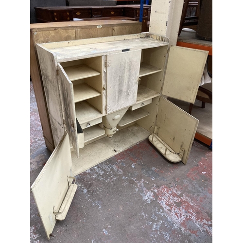 419 - A mid 20th century white painted kitchen cabinet