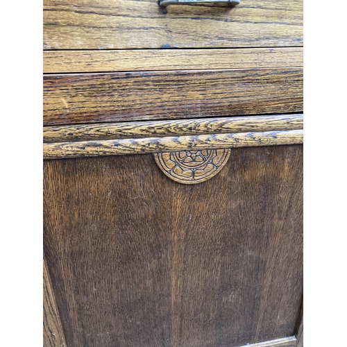 426 - An Art Deco oak sideboard - approx. 120cm wide x 98cm high x 46cm deep