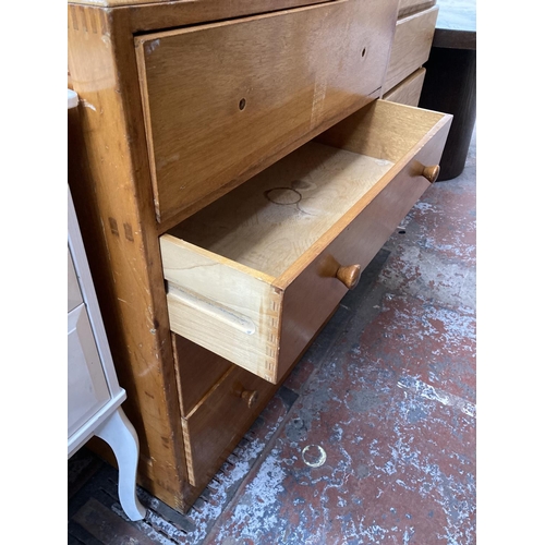 438 - A 1950s oak chest of drawers