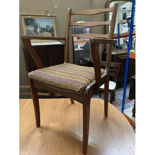 445 - A 1960s Sutcliffe S Form teak extending dining table and eight matching dining chairs to include two... 