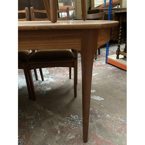 445 - A 1960s Sutcliffe S Form teak extending dining table and eight matching dining chairs to include two... 