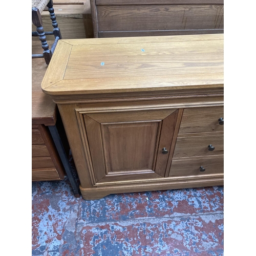 450 - A modern solid oak sideboard - approx. 151cm wide x 86cm high x 48cm deep