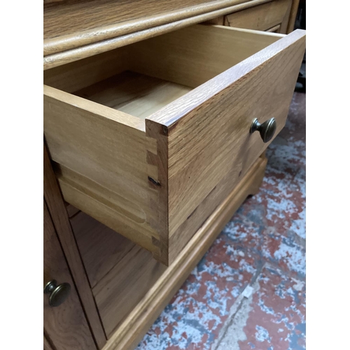 450 - A modern solid oak sideboard - approx. 151cm wide x 86cm high x 48cm deep