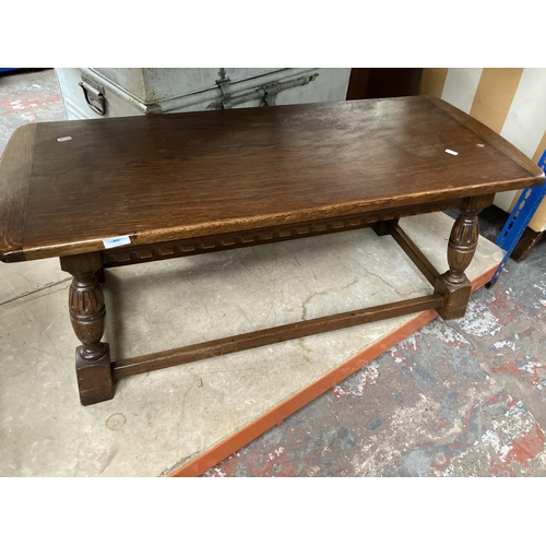 459 - Three items, an oak rectangular coffee table, wicker and cane chest of drawers and a vintage metal t... 