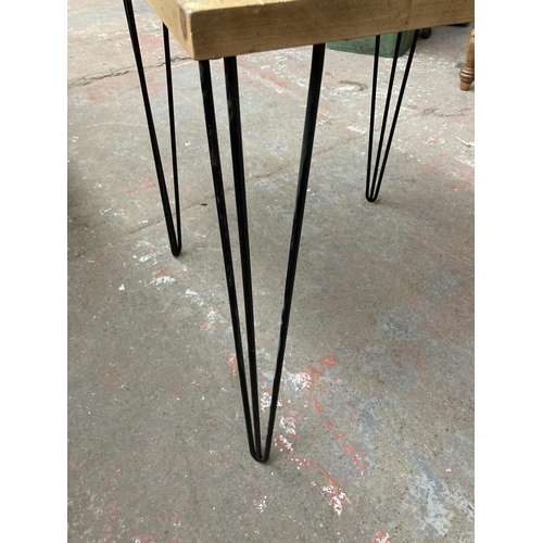 469 - A modern oak square bistro table on hairpin legs