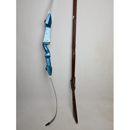 268 - Two items, an Armex archery bow and a 19th century style musket rifle