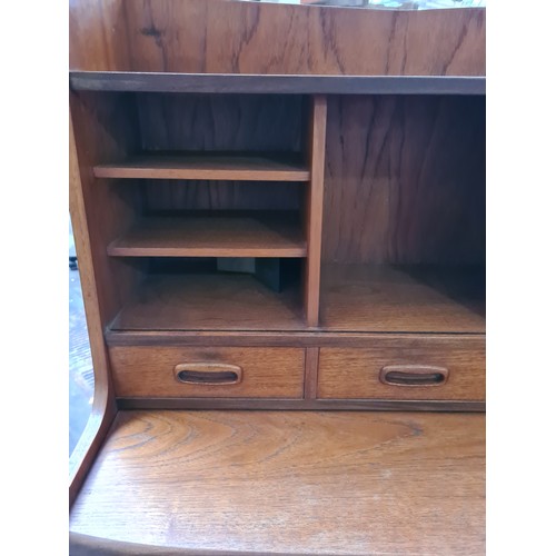 359 - A mid 20th century teak bureau