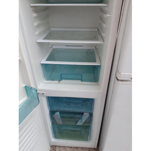 1070 - A Swan A+ class upright fridge freezer