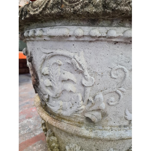 1245 - A large cast stone garden planter approx. 28