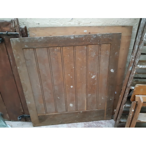 1250 - Two wooden barn doors, one approx. 42