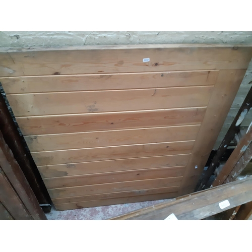 1250 - Two wooden barn doors, one approx. 42