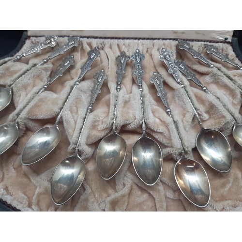 10 - A cased set of twelve Knapp & Schlesinger hallmarked 800 grade silver spoons - approx. 98 grams