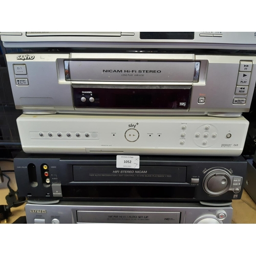 1052 - Seven items of audio visual equipment to include one Sky+ set top box, one Aiwa FX4100 Nicam Stereo ... 