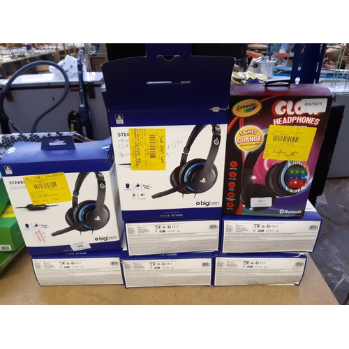 1057 - Eight boxed shop return items, seven Playstation 4 and Vita stereo gaming headsets and one pair of C... 