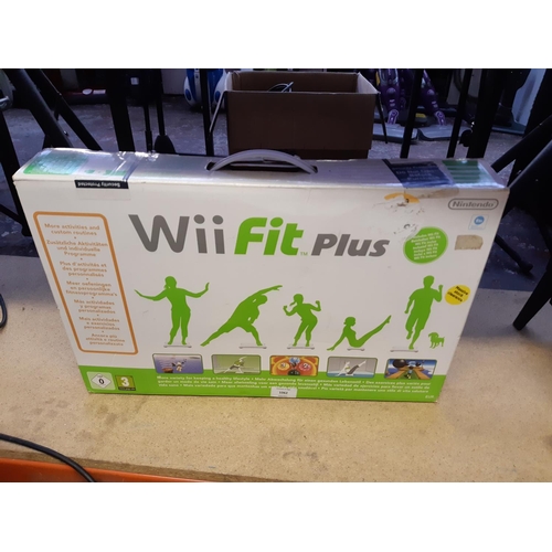 1062 - A boxed as new Wii Fit Plus game and balance board